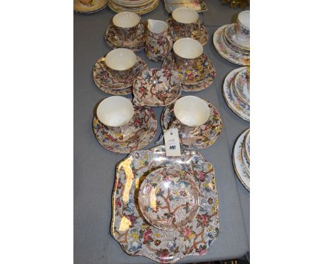 A Maling brown 'Chintz' pattern part tea service, to include: cream jug, sugar bowl, tea cups and saucers; and other items.