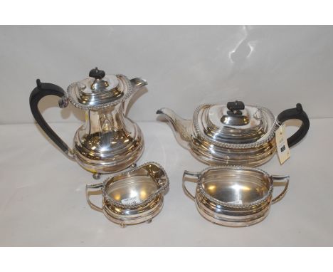 A silver plated four-piece tea service, by Walker & Hall, comprising: teapot, hot water jug, sugar pot and cream jug, no. 347