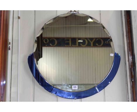Circular Art Deco style wall mirror with tinted blue glass panels