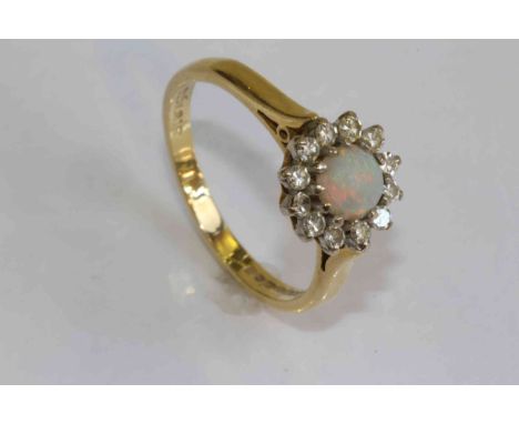 18 carat gold, opal and diamond cluster ring