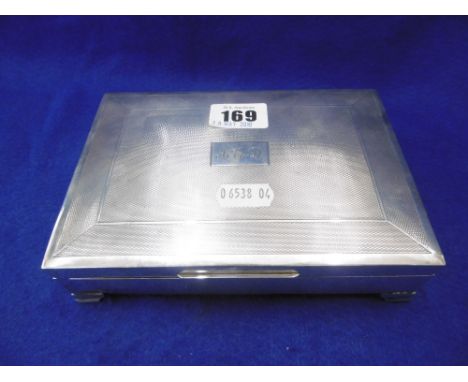 A HALL MARKED SILVER ENGINE TURNED CIGARETTE BOX