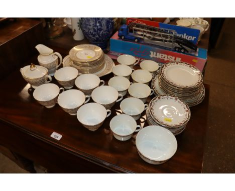 A quantity of Royal Doulton "Sovereign" pattern tea and dinnerware; and a small quantity of Radfords Crown china saucers and 