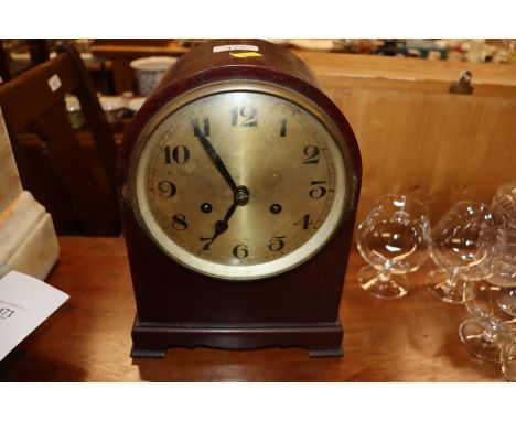 A mahogany cased two hole mantel clock 