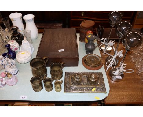 A quantity of brass graduated tankards; pewter jug; Russian doll; a carved wooden trinket box; brass compass; double brass in