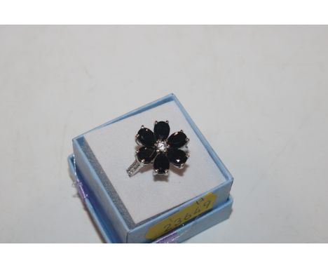 A Sterling silver black spinel and white topaz flower ring, ring size S