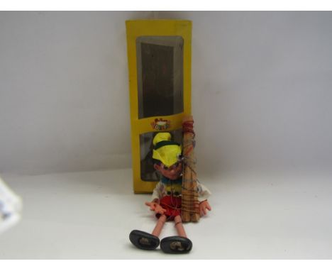 A boxed Pelham puppet "Pinnochio"