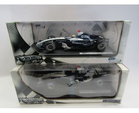 Two boxed Hot Wheels 1:18 scale diecast Formula One cars including Nico Rosberg Williams-Toyota FW29 (a/f) and Mark Webber Wi