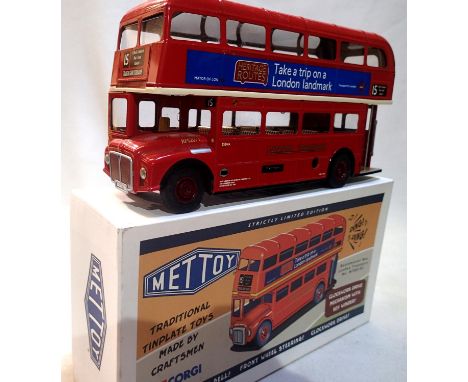 Mettoy tinplate London bus, clockwork, steering wheels, ringing bell, approximate L: 24 cm, in excellent condition, boxed, no