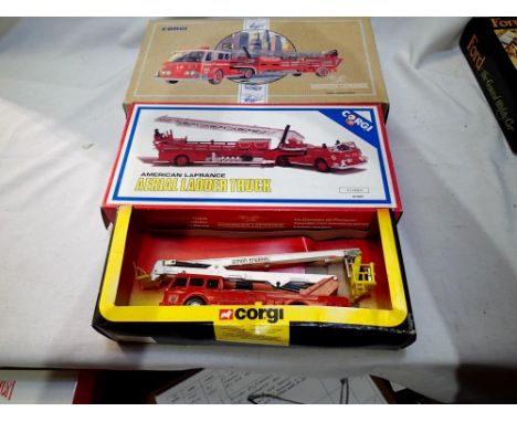 Three Corgi fire engines to include 1126 Simon Snorkel, 97320 La France ladder trucker open cab and 97321 La France ladder cl