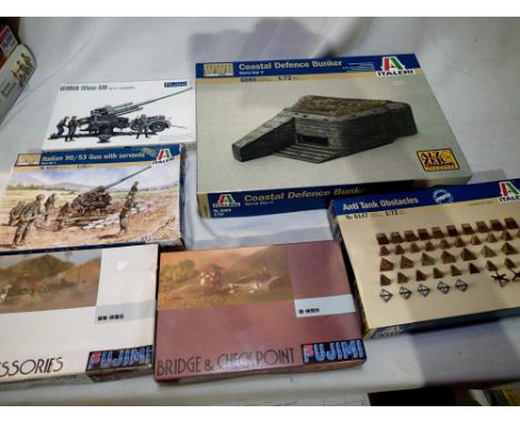 Six 1/72 scale military related kits to include Fujimi bridge and checkpoint, field accessories, German 105 mm gun, Italeria 