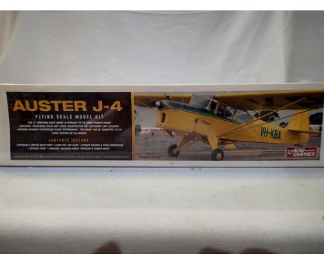 Aero Graphics Auster J-4 flying scale model kit, balsa/tissue construction, rubber powered, sealed as new. P&amp;P Group 1 (£