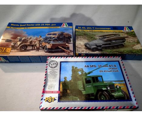 Three 1/72 scale military vehicle kits to include Italeria Morris tractor and gun, Italeria Pionerpanzerwagen and PST Z15 hal