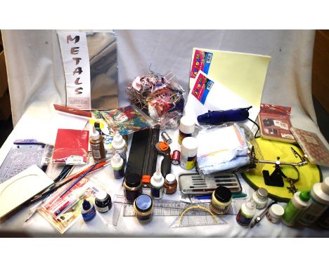 Quantity of craft tools and materials icluding glues, paints, brushes, fabric, calligraphy, threads etc. Picture shows part o