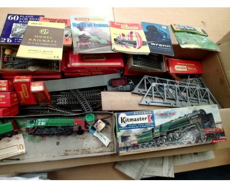 OO scale Triang railways, a quantity of track and points, five boxed wagons, girder bridge, track supports, catalogues and bo