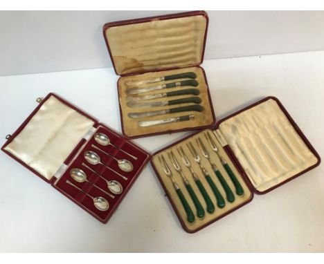 A cased set of six George V silver pronged forks with jade coloured pistol grip handles by Sutherland &amp; Roden, together w