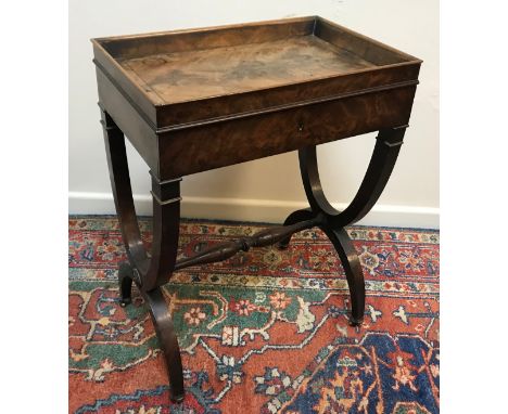 A Regency Empire style occasional table, the tray top above a single frieze drawer with fitted slide raised on X frame suppor