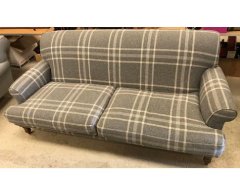 A modern grey check upholstered scroll arm sofa on turned and stained beech front legs 228 cm wide x approx. 108 cm deep x 85
