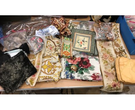 A box of assorted crosswork bell pull/vestment parts, Oriental silk panels, crewel work sample, an RAF tea cosy, various roll