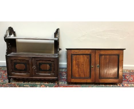 A Victorian mahogany wall cabinet, the two panelled doors enclosing two pairs of small drawers and recesses 64 cm wide x 14 c