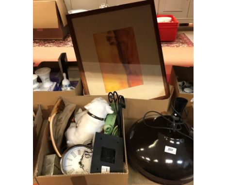 A box of sundry ornaments, clocks, etc and a box of assorted decorative pictures, together with a modern table lamp