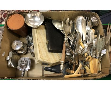 A box containing various plated cutlery including condiments, hip flask, goblet, fish knives and forks, etc