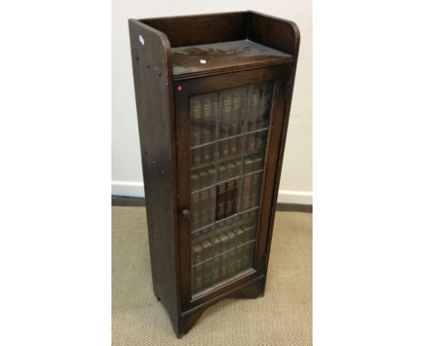 A Victorian pitch pine dressing table with mirrored superstructure over two frieze drawers on turned legs united by a pot she