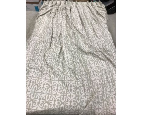 A pair of linen weave green and beige C scrolling blackout interlined curtains with pleated velvet edges and fixed double pen