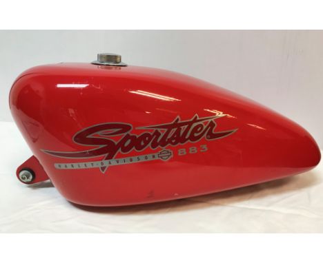 A Harley Davidson Sportster 883 petrol tank, red 51 cm long x approx. 25.5 cm wide
