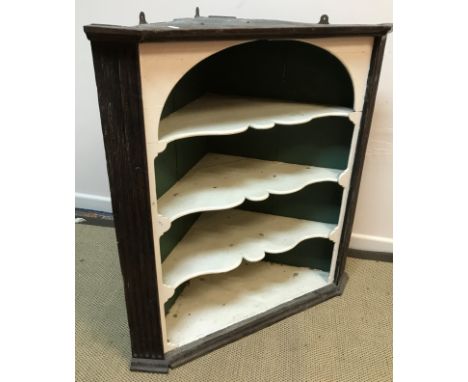 A Georgian oak hanging corner cupboard with painted three shelf interior as a corner shelf unit (cupboard door missing) 91.5 