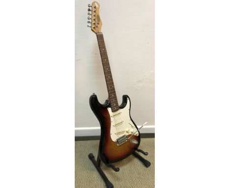 A Stagg Stratocaster copy guitar, sunburst body