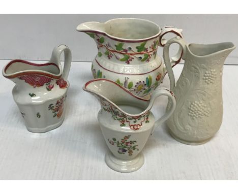 Two 18th Century silver shaped Worcester style cream jugs, approx 11 cm high each, a pink lustre and floral relief decorated 