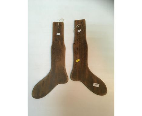 A Hawick (Cashmere) vintage wooden jumper frame, together with a pair of vintage wooden sock frames