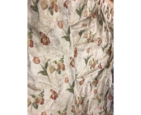 A pair of cotton type gold ground floral decorated lined curtains with fixed triple pencil pleat headings, together with a se