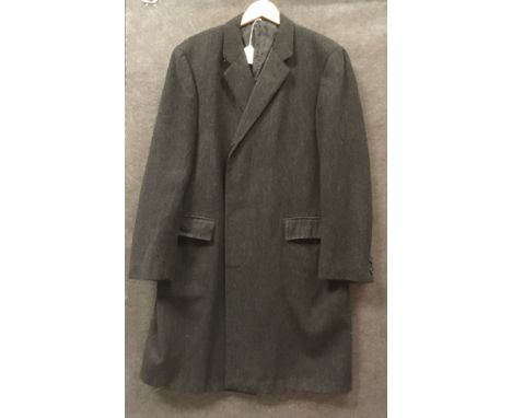 A collection of gent's tailoring comprising an Austin Reed charcoal grey pinstriped suit, a Daks for Simpson charcoal grey si