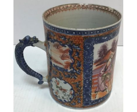 A Chinese Kang Xi blue and white and polychrome decorated mug, the main panel decorated with figures in a courtyard setting w