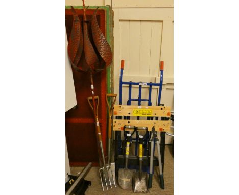 A sack barrow, Black and Decker work mate, selection of tools, garden wind vane and a Bosch cordless hedge trimmer.