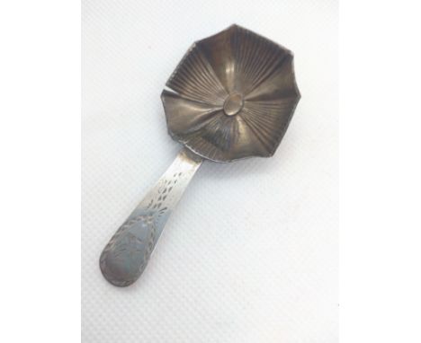 A George III sterling silver caddy spoon. Circa 1790. Split. 