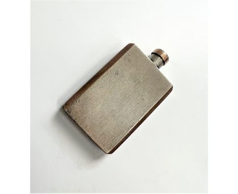 A Sterling Silver Flask. Asprey London 1938. Engine turned decoration. 7.5cm long 27.1 grams