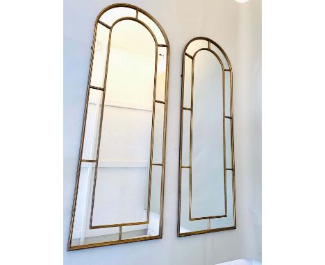 ARCHITECTURAL WALL MIRRORS, 180cm H x 63cm W, a pair, Regency style, gilt metal arched frames. (2) 