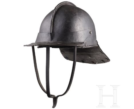 Zischägge, sog. "pot helmet", England oder Niederlande, um 1640  Zweiteilig geschlagene Glocke mit niedrigem Kamm, klappbarer
