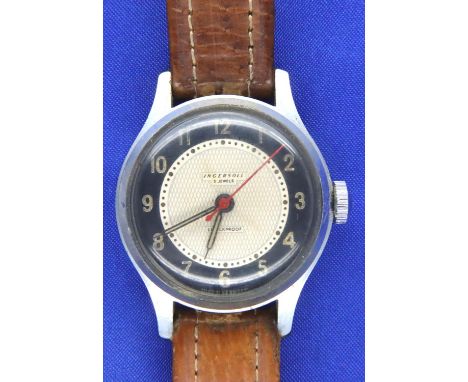 Ingersoll; gents steel cased manual wind wristwatch, 15 jewel movement on a leather strap, intermittently working. P&amp;P Gr