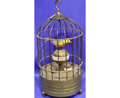 Clockwork bird clock in a cage, H: 22 cm. Working at lotting. P&amp;P Group 3 (£25+VAT for the first lot and £5+VAT for subse
