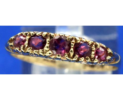 9ct gold ruby set ring, size S/T, 1.6g. P&amp;P Group 1 (£14+VAT for the first lot and £1+VAT for subsequent lots) 