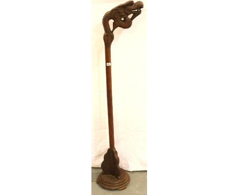 Oriental carved hardwood freestanding standing lamp with a carved dragon to upper section (H: 180cm). Not available for in-ho