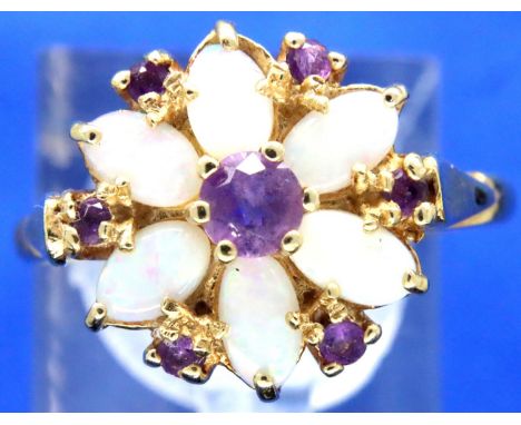 14ct gold flower head set ring of six opals and seven amethysts, size Q/R, 3.3g. P&amp;P Group 1 (£14+VAT for the first lot a