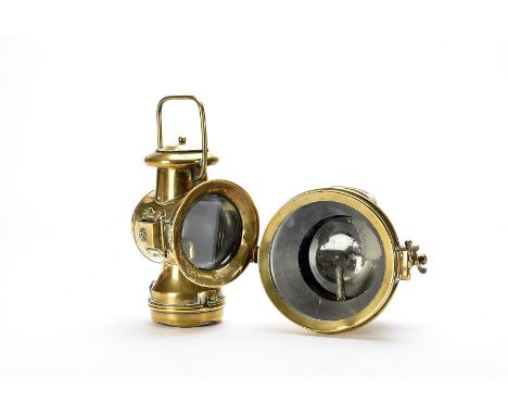 Motoring, lamps,  a large H&B projector lamp in brass , Acetylene type approx 17.5cm bezel together with a  side mounting bra