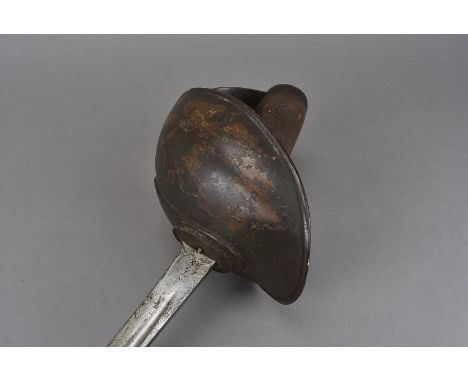 A British 1908 pattern cavalry sword, marked P 08 to the spine of the blade with broad arrow and EFD to the side of the blade