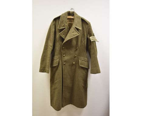 A 1939 pattern olive Greatcoat, by G Glanfield & Son Ltd, dated 1940, size No.5, with sergeant patch to arm 