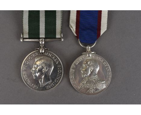 A George VI Royal Naval Reserve Long Service and Good Conduct medal, awarded to 3149 U. T.F.HOWIE.STO. R.N.R, together with a