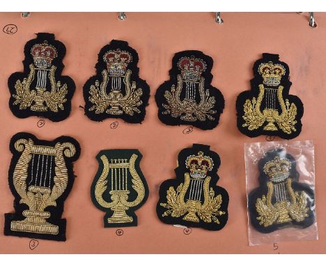 A group of 100+ Bullion and cloth badges, including County of London Sharpshooters, Light Machinegun Marksman, Anti-Tank Gunn